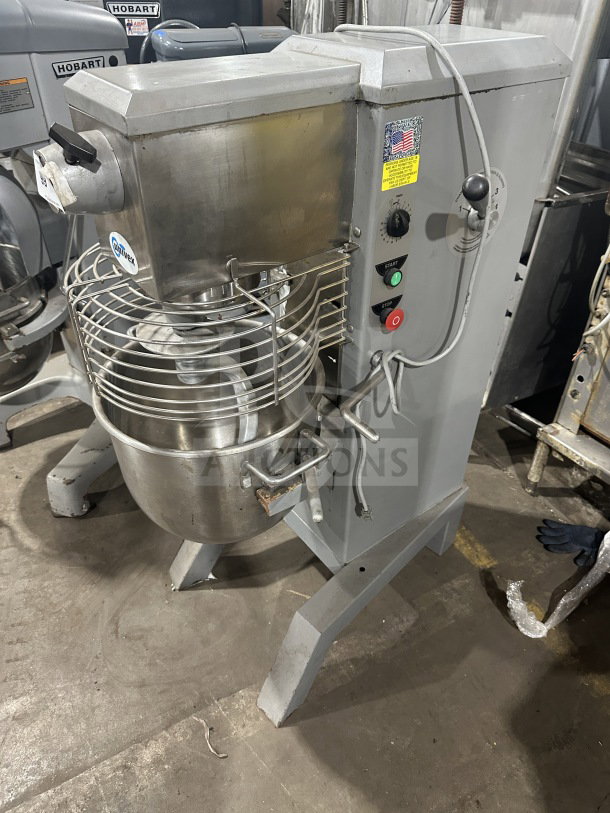 Univex SRM30+ 30 Qt planetary mixer with splash guard, stainless steel bowl, and dough hook. Model M14010069, on legs.