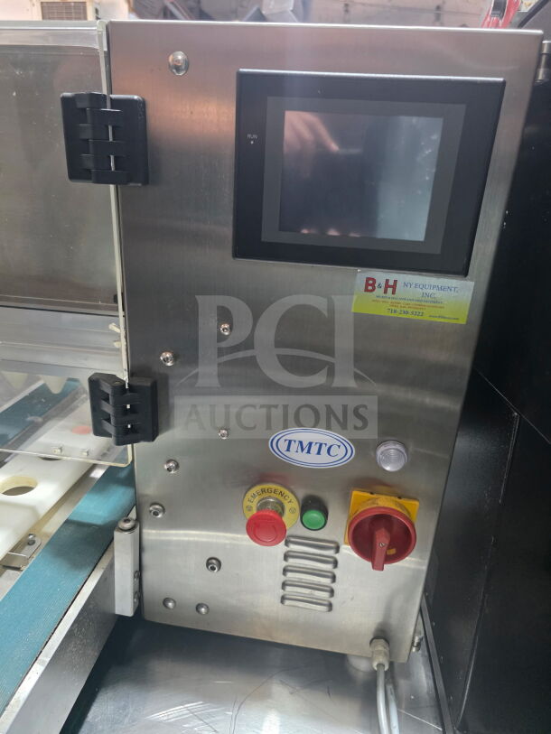 TMTC MINIDROPPY stainless steel automatic cookie depositor machine, model 4038-10S2-DIS. Features control screen, emergency stop.