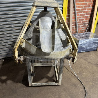 Commercial stainless steel conical dough rounder machine in fair condition, electric-powered with visible wear.
