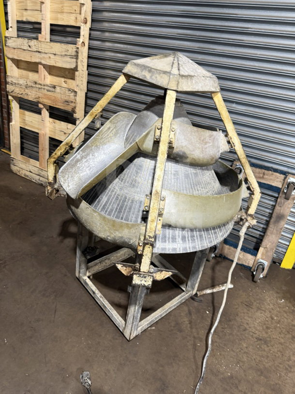 Commercial stainless steel electric conical dough rounder machine, showing framework and conical design. Used condition.