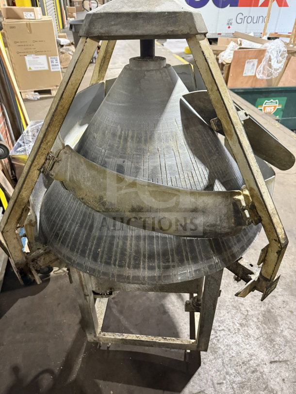 Commercial stainless steel conical dough rounder machine, electric powered, sturdy frame, used condition.