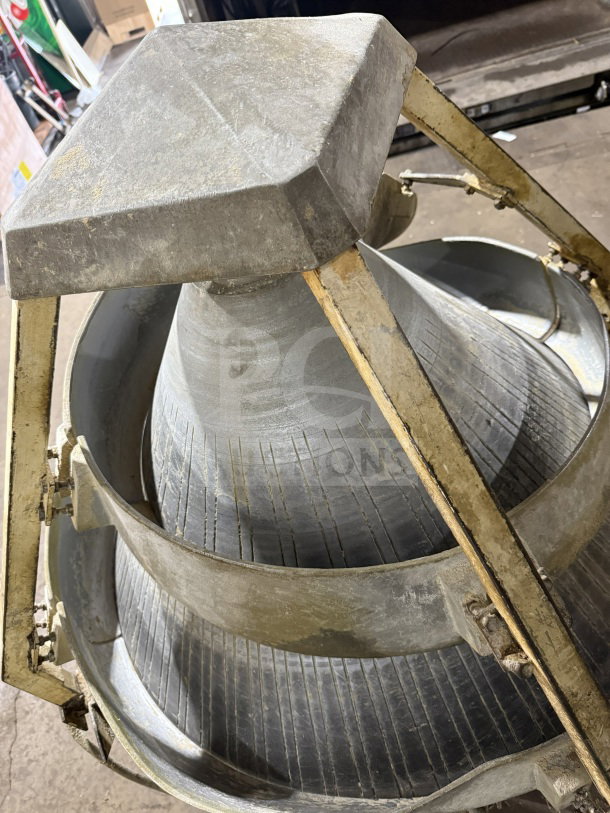 Commercial stainless steel electric conical dough rounder machine, used condition, with visible wear and robust construction.