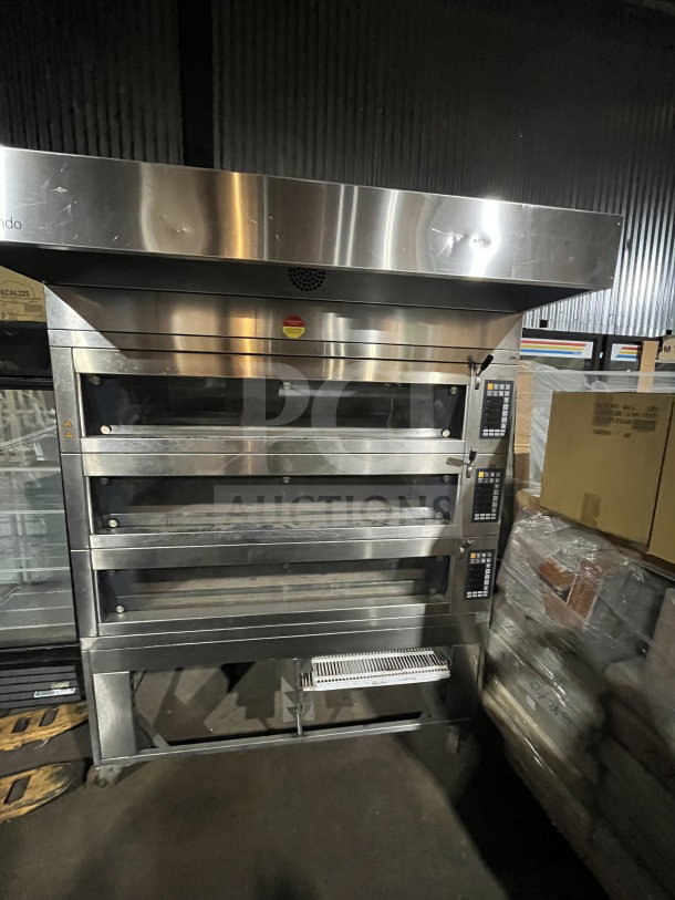 Empire Miwe stainless steel triple deck oven, model CO31408, steam injected for artisanal bread, on casters, 208V.