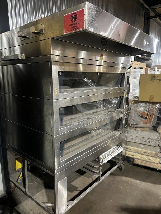 Empire Miwe stainless steel triple deck oven, Model LFRСE15T5070, steam injected, 208V, on casters, good condition.