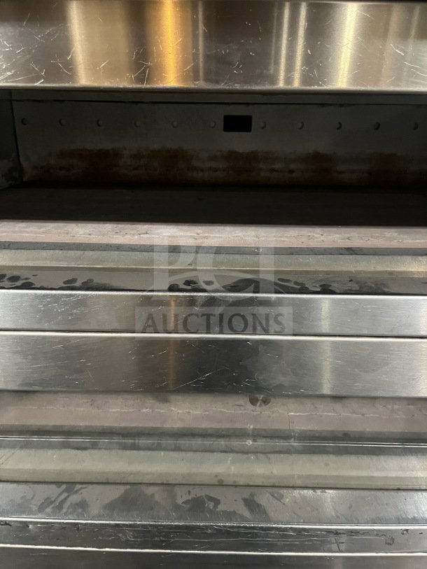 Empire Miwe stainless steel electric triple deck oven, steam injected, on casters. Model CO31408, 208V, used condition.