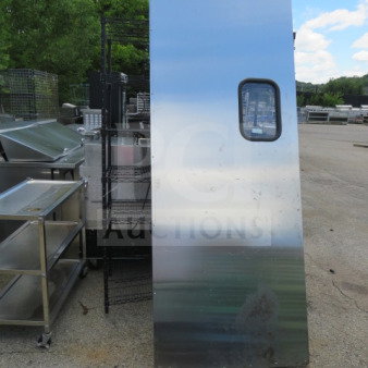 Stainless steel kitchen traffic door, 35.5x95 inches, with viewing window. Used condition with visible wear.
