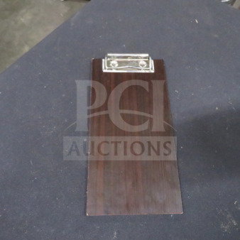One of 12 check presenters, dark wood finish, features metal clip. Ideal for restaurants, good condition.