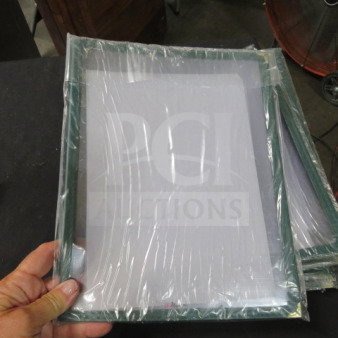 Lot of 18 new tri-fold menu holders in packaging, green borders, ideal for restaurants, pristine condition.