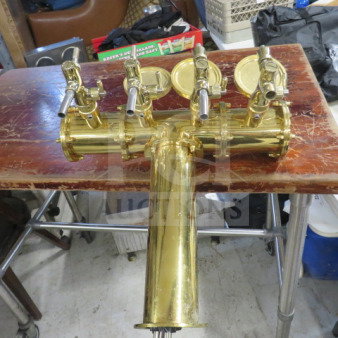 Gold keg tower with 4 taps, polished finish, excellent condition. Ideal for bar setups or home brewing systems.