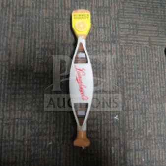 Leinenkugel's Summer Shandy tap handle, yellow top with a lemon graphic, logo in red, excellent condition.