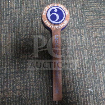 West Sixth Brewing tap handle, Cocoa Porter, wooden with blue and white logo, "Pay It Forward" text, good condition.