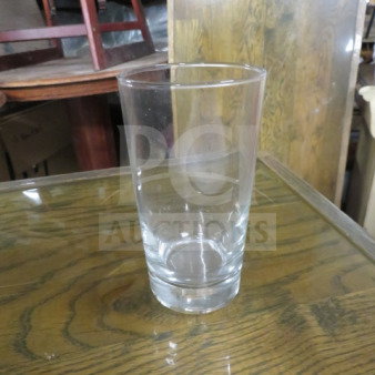 Clear beer flight glass, cylindrical shape, pristine condition, no visible markings. Ideal for tastings.