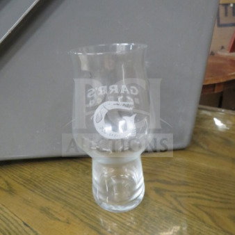 Transparent beer glass with "Carpe Diem" etched on the front, in new condition. Flared top with sturdy base.