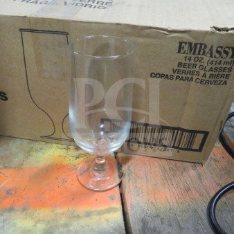 New 14oz stem beer glass, clear. Includes original packaging. Markings show "EMBASSY 14 OZ. BEER GLASSES."