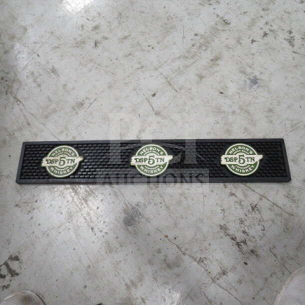 Nelson Greenbrier Whiskey bar mat, black rubber, three circular logos, DSP 5 TN markings, in good condition.