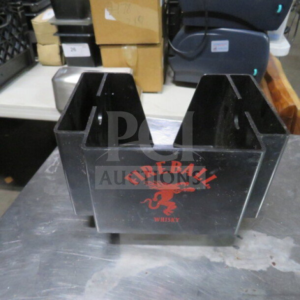 Fireball Whiskey bar organizer, black with red Fireball logo, used condition, ideal for holding bar supplies.