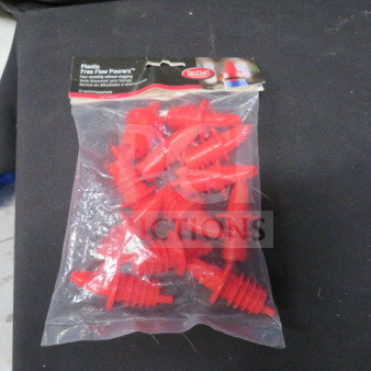Bag of 12 new red free flow pourers, plastic material, in original packaging.