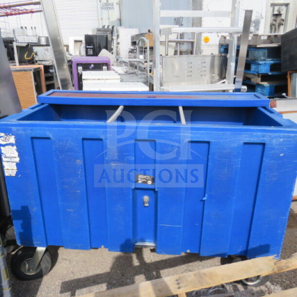 Blue Sper Arctic Beverage Cooler, Model IRP-2043, on casters. Measures 60x30x43 inches. Used condition with visible markings.