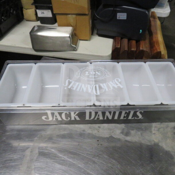 Jack Daniels domed bar center with six compartments, new condition, branded top.