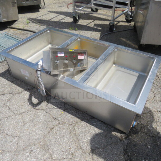 Wells MOD300TDM three-well drop-in food warmer, stainless steel, 43.5x24x11, used condition, control panel visible.