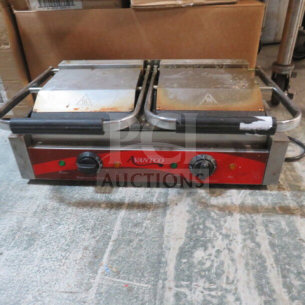 Avantco Dual Panini Press, Model 177P85S, features dual grilling surfaces, visible wear, 120V, temperature controls.