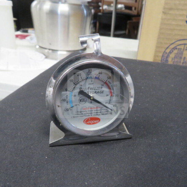 Cooper fridge/freezer thermometer, stainless steel, dial display, NSF certified, in good condition, with clear markings.