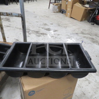 Black flatware holder with four compartments, in used condition. Suitable for organizing utensils.