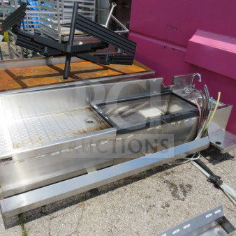 Perlick underbar unit with ice well, drain table, hand sink, blender shelf, speed rail, 78.5x30 inches. Assembly required.