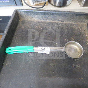 4oz commercial spoodle with green handle, stainless steel, lightly used. Tag labeled "96."