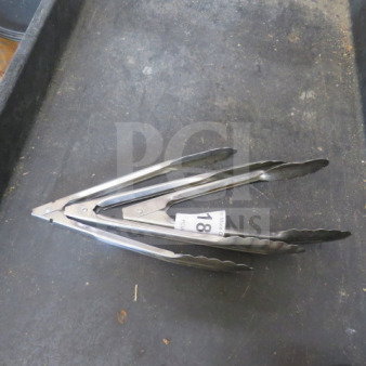 Stainless steel tong, 3XBID model, in good condition with auction tag number 18 visible.