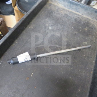Metal knife sharpener with black handle, good condition, showing lot number tag.