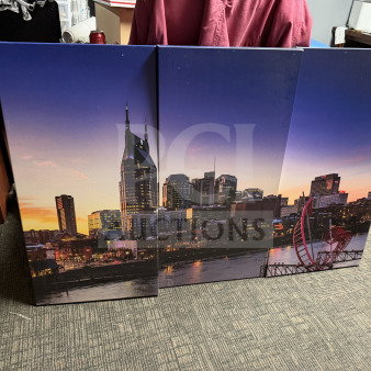 Three-panel canvas of Nashville skyline at sunset, each 18x36 inches. Vibrant colors, good condition.