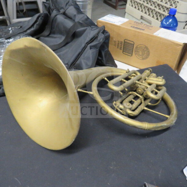 Vintage brass French horn decor, intact condition, intricate valve design, for decorative purposes, no visible maker marks.