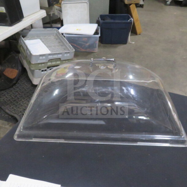 Cambro 18x26 clear dome display cover, model DD1826CW, new condition, with handle, ideal for food presentation.
