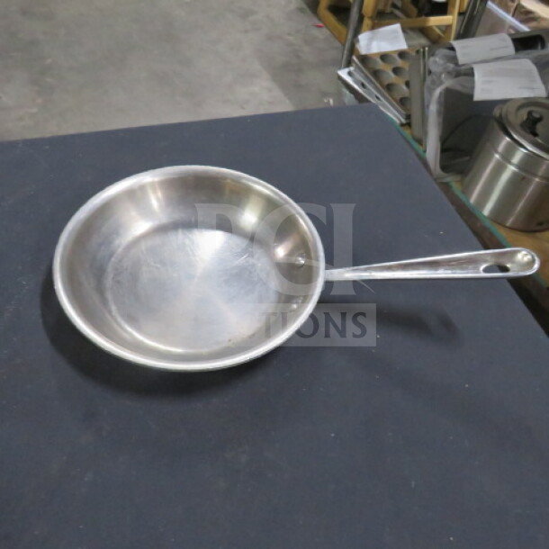 Williams Sonoma All Clad 8" stainless steel sauté pan, gently used, riveted handle, ideal for versatile cooking.