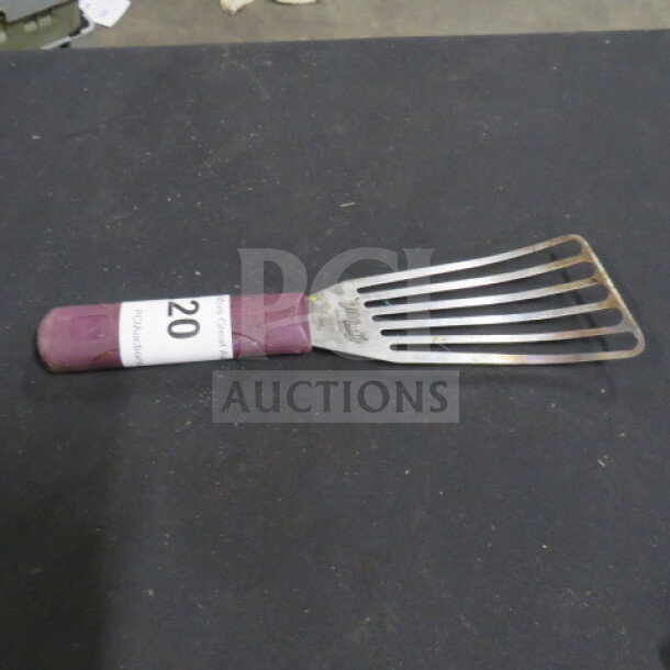 One Hells Handle By Mercer Fish Turner, Model M33183, metal with a purple handle, used condition.