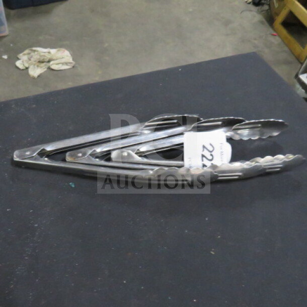 Vollrath 9 Inch Stainless Steel Tongs, Model 47309, lightly used, with tag indicating item #3XBID.