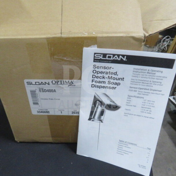 New Sloan Optima Plus Sensor Activated Deck Mounted Soap Dispenser, Model ESD400A. Box and manual included.