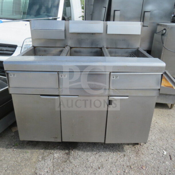 Frymaster MJ350 natural gas 50lb 3-unit floor fryer with millivolt controls, stainless steel, used, excellent condition.