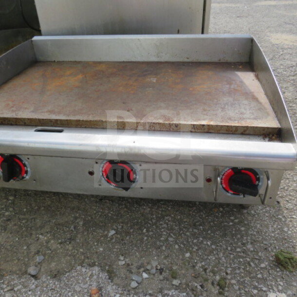 Star One Star Electric 36" thermostatic griddle, used condition, 208-240V, dimensions 36"x27"x15".