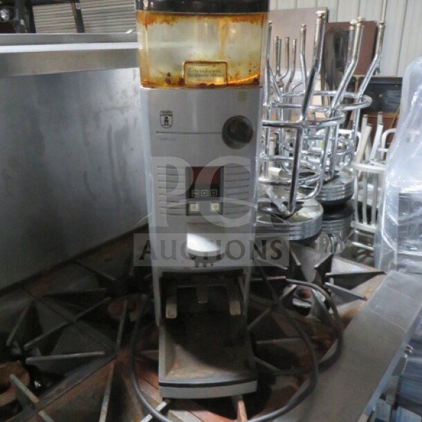 AZ Koyen Grinder M-02, silver, used condition. Features digital display, bean hopper. Model# M-02 visible.