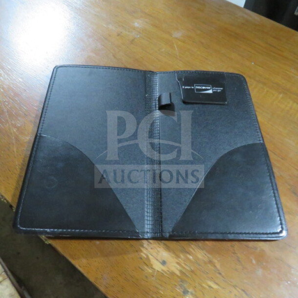 One lot of 10 black leather check presenters, excellent condition, with card slots and pen holder. Ideal for restaurants.