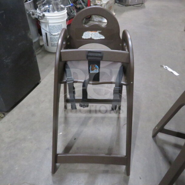 Koala Kare poly high chair with safety straps, brown, sturdy design, visible brand logo, ideal for restaurants or home use.
