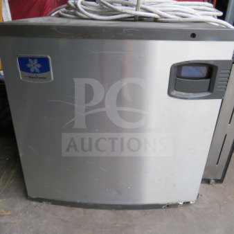 Manitowic Ice Maker, Model IY052A4-161, 115V, 22x25x22 in., used condition, visible scuffs, metal finish with brand logo.