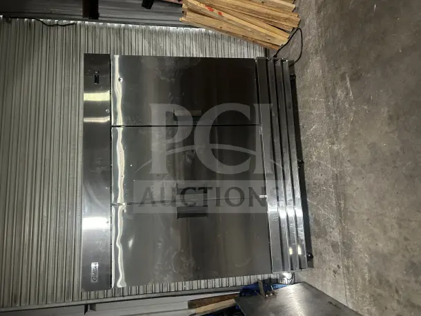 Coldline C-3FE 3-Door Freezer on casters, 115V, stainless steel, model label, 81x32x81.5 inches, excellent condition.