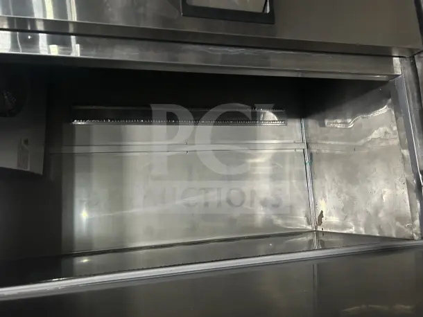 Coldline Model C-3FE three-door freezer on casters, stainless steel, 115V, interior view, dimensions 81x32x81.5 inches.