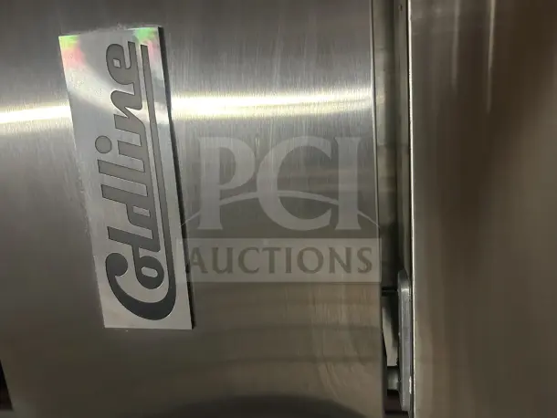 Coldline 3-door freezer on casters, model C-3FE. Stainless steel, 81x32x81.5 inches, 115V.  Condition: working.