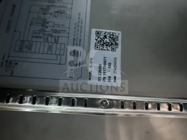 Coldline Model C-3FE freezer tag showing model and serial numbers. Verification and circuit diagram details visible.
