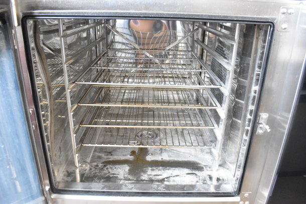 2023 Blodgett Invoq Hybrid 6-2/1 GN commercial oven interior, stainless steel racks, electric, new condition.