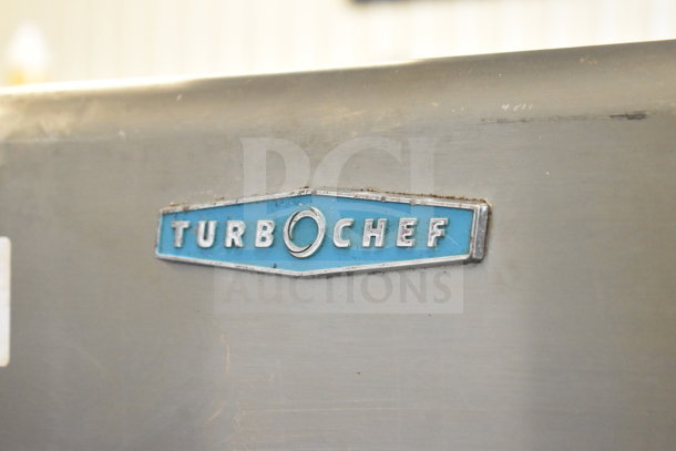 Turbochef HhC2020 commercial rapid cook oven logo on stainless steel surface.